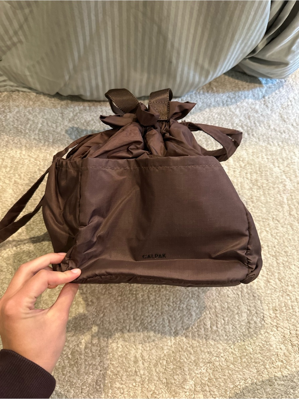 Calpak brown cinch top insulated lunch bag